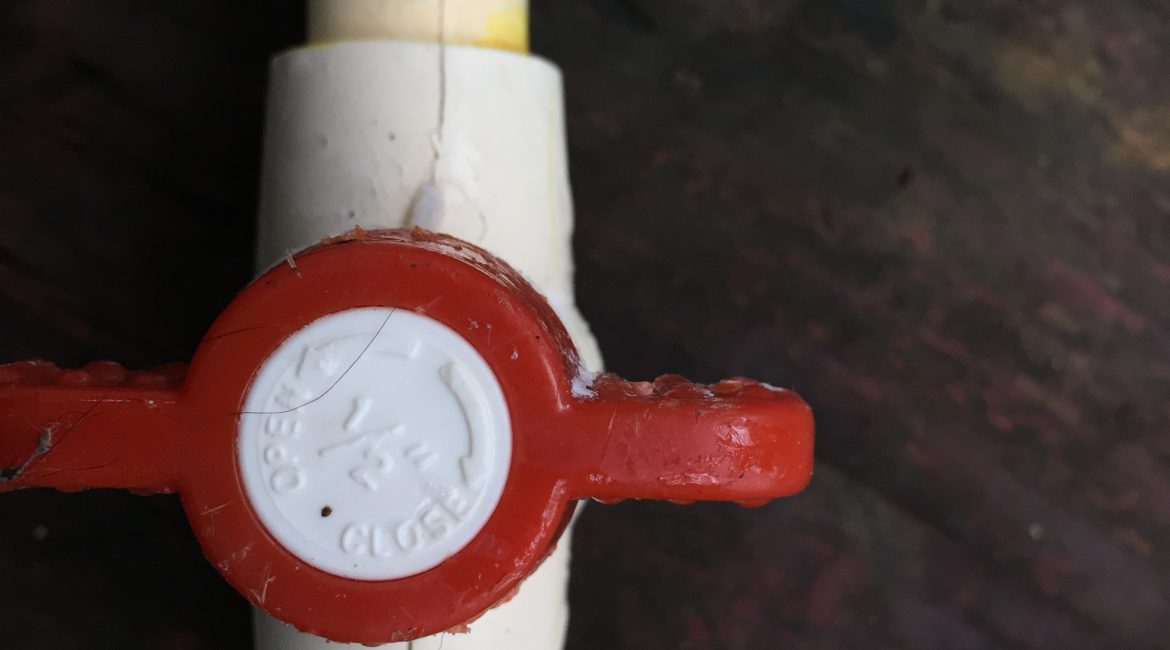 Photo 1: The author discovered a plumbing leak caused by a cracked water heater bypass valve.
