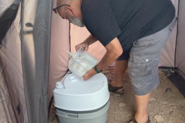 RV or tent camping? When you tent camp, you may need to use a portable camping toilet like the one shown in this picture.