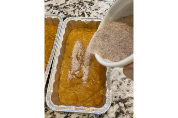 sprinkling cinnamon on the bread before baking