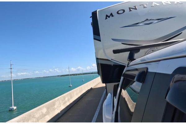 Picture of the Florida Keys with ocean and a view of a fifth wheel RV