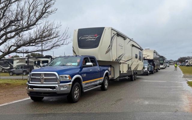 Truck pulling a fifth-wheel travel trailer