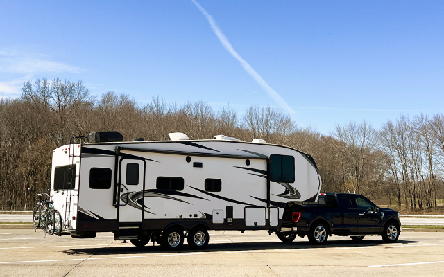 Fifth-wheel RV in a parking lot